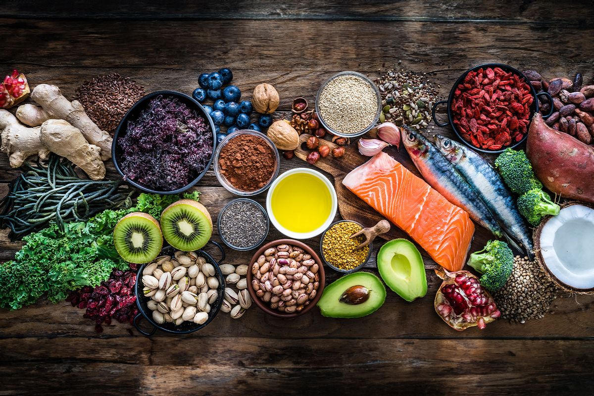 Top view of healthy, antioxidant group of food shot on rustic wooden table. (Getty Images/fcafotodigital)