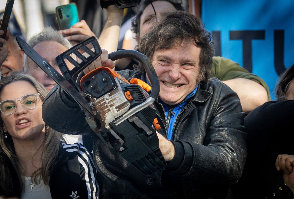 Presidential candidate Javier Milei of La Libertad Avanza lifts a chainsaw during a rally on September 25, 2023 in San Martin, Buenos Aires, Argentina. (Tomas Cuesta/Getty Images)