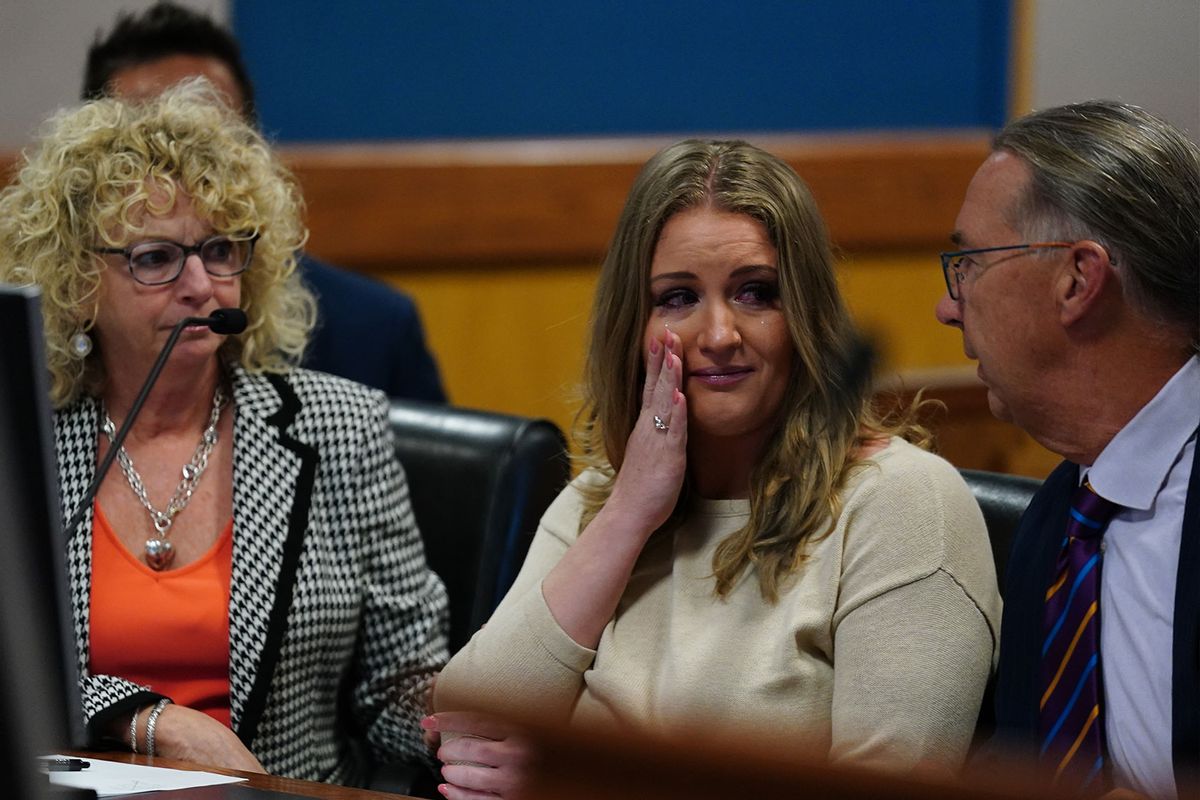 Jenna Ellis reacts after reading a statement after Ellis pleaded guilty to a felony count of aiding and abetting false statements and writings, inside Fulton Superior Court Judge Scott McAfee's Fulton County Courtroom at the Fulton County Courthouse October 24, 2023 in Atlanta, Georgia. (John Bazemore-Pool/Getty Images)