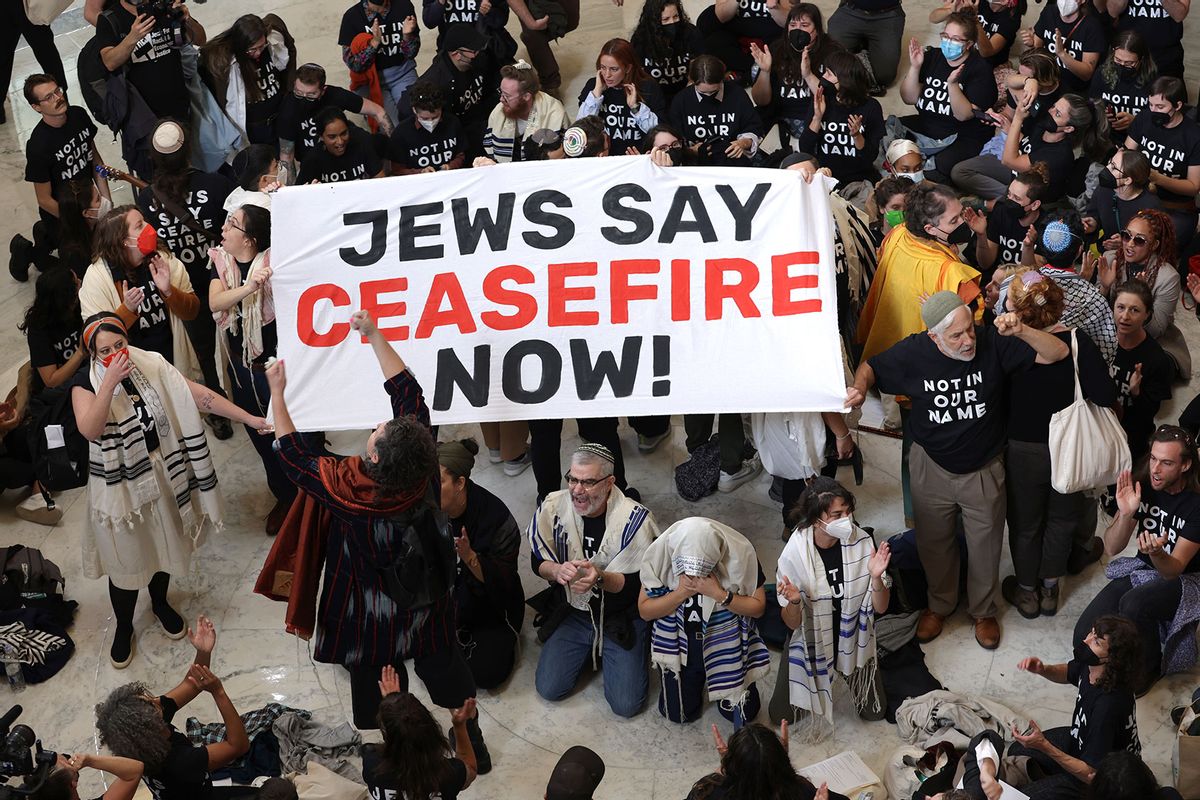 Protesters hold a demonstration in support of a cease fire in Gaza in the Cannon House Office Building on October 18, 2023 in Washington, DC. Members of the Jewish Voice for Peace and the IfNotNow movement staged a rally to call for a cease fire in the Israel–Hamas war. (Alex Wong/Getty Images)