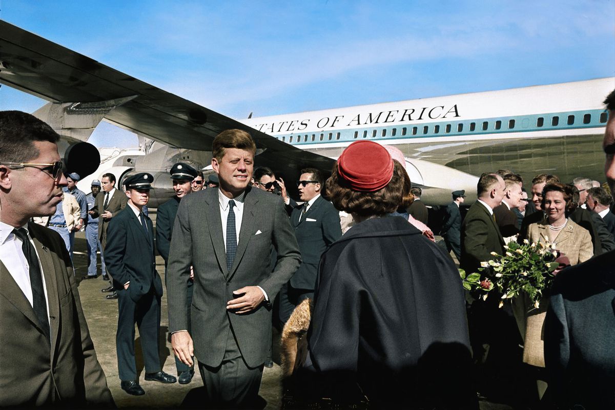 This colorized archival image shows Paul Landis (far left) standing near President John F. Kennedy as he arrives at Love Field in Dallas, Nov. 22, 1963. (Dallas Times Herald Collection/The Sixth Floor Museum at Dealey Plaza)