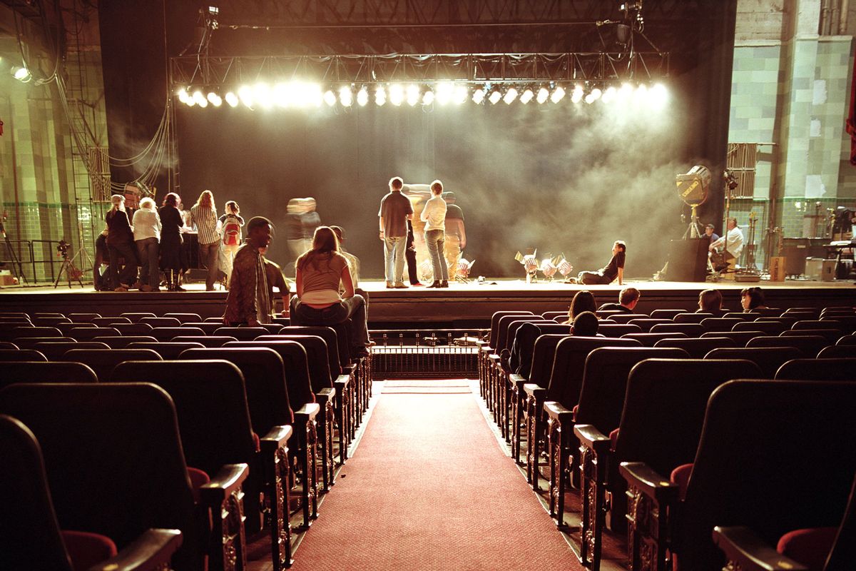 People on stage in empty theatre (Getty images/Siri Stafford)