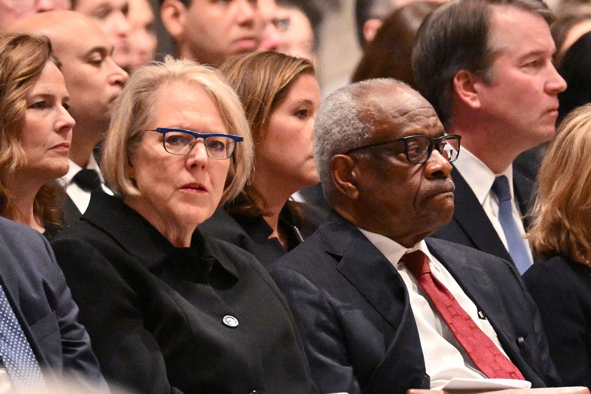US Supreme Court justice Clarence Thomas and his wife Ginni Thomas attend a memorial service for former US Supreme Court Justice Sandra Day O'Connor at the National Cathedral in Washington, DC, on December 19, 2023. (MANDEL NGAN/AFP via Getty Images)