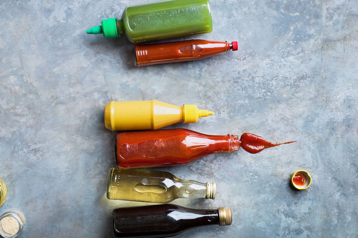 Condiments in bottles (Getty Images/Johner Images)