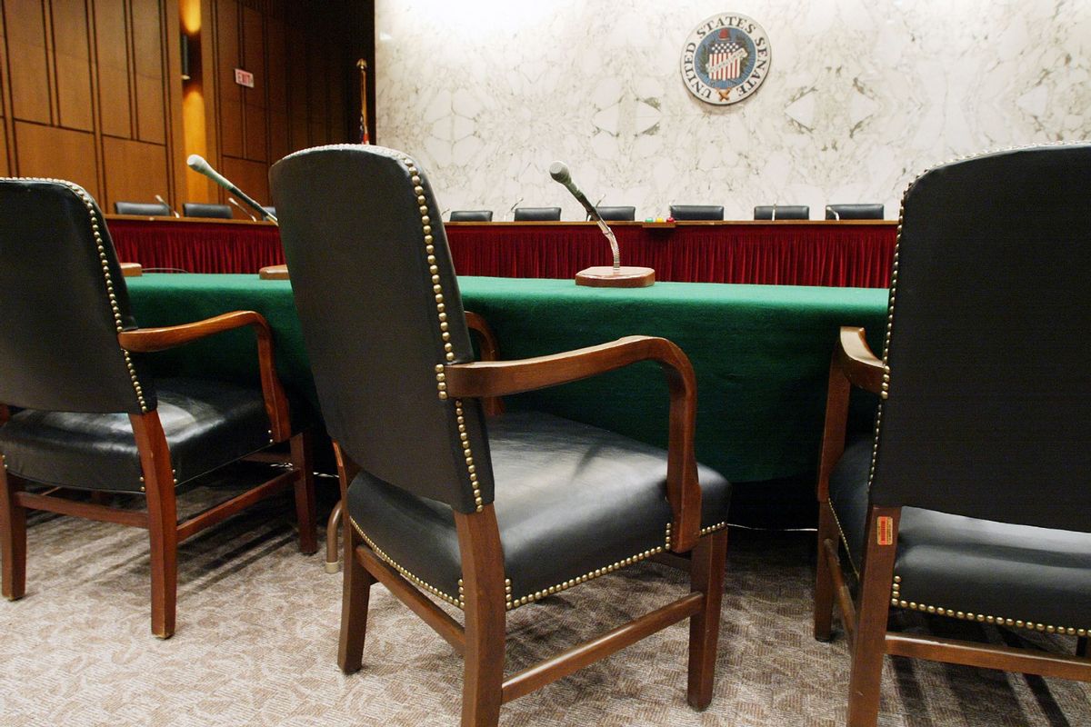 Empty chairs sit in a Senate hearing room. (Alex Wong/Getty Images)