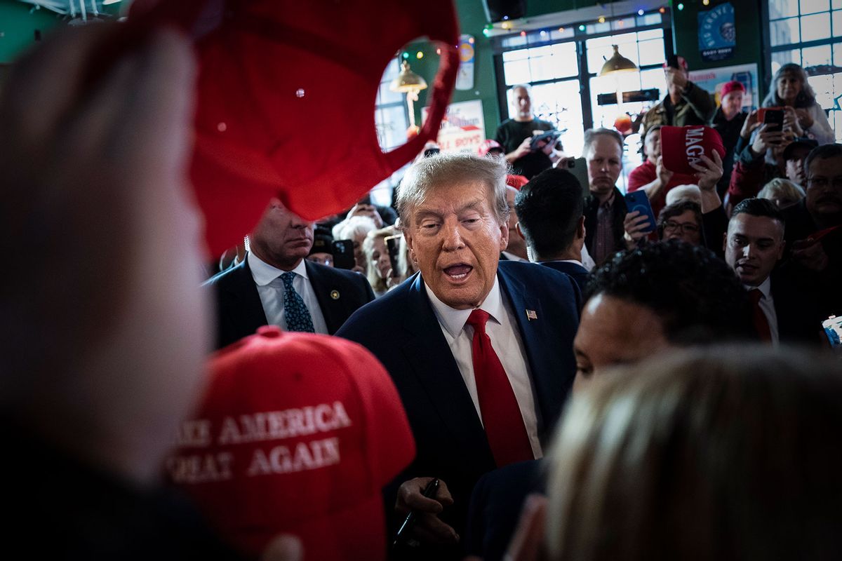 Former President Donald Trump arrives to speak at a Commit to Caucus rally held at Whiskey River on Saturday, Dec. 02, 2023, in Ankeny, Iowa. (Jabin Botsford/The Washington Post via Getty Images)