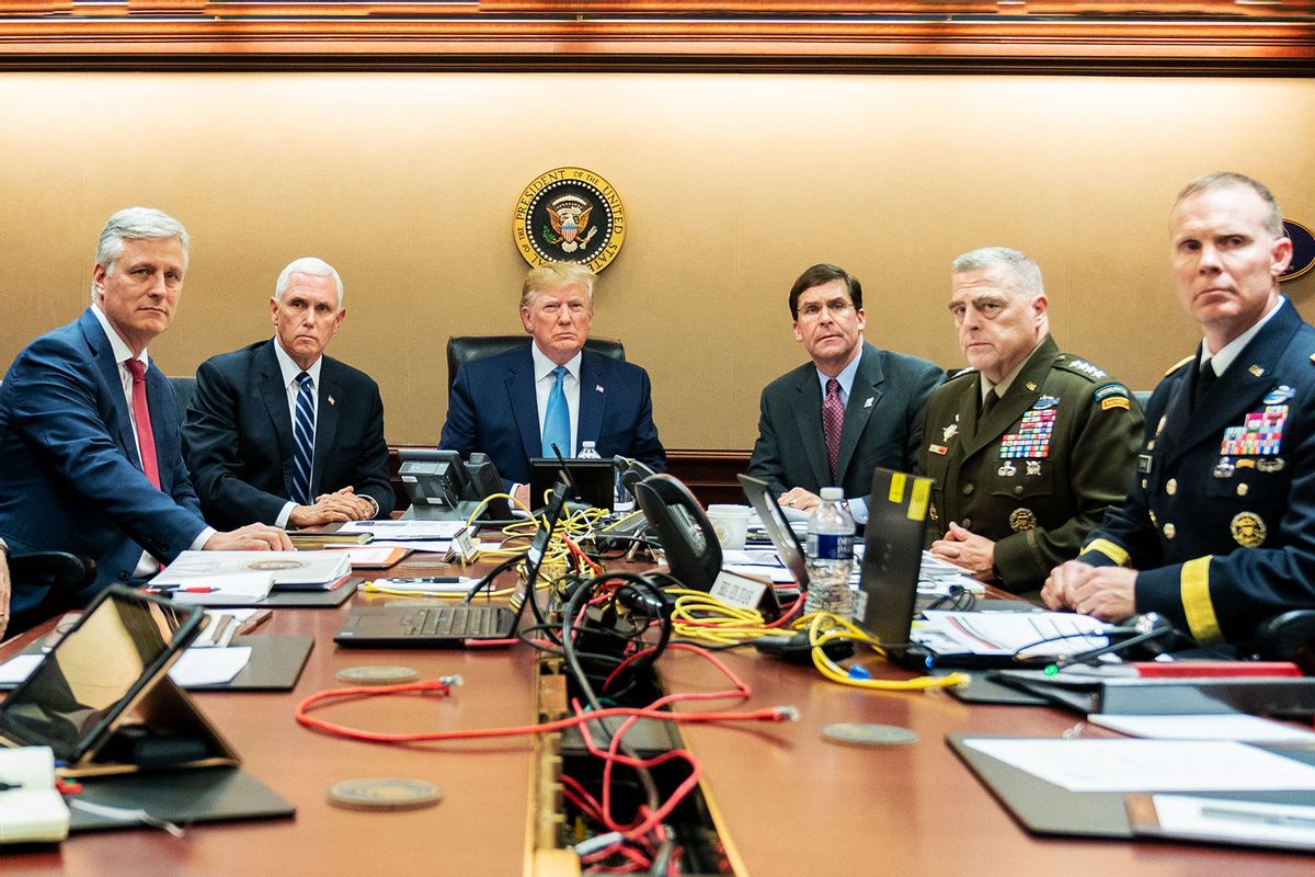 In this handout photo provided by the White House, President Donald J. Trump is joined by Vice President Mike Pence (2nd L), National Security Advisor Robert O’Brien (L), Secretary of Defense Mark Esper (3rd R), Chairman of the Joint Chiefs of Staff U.S. Army General Mark A. Milley (2nd R) and Brig. Gen. Marcus Evans, Deputy Director for Special Operations on the Joint Staff in the Situation Room of the White House October 26, 2019 in Washington, DC. (Shealah Craighead/The White House via Getty Images)