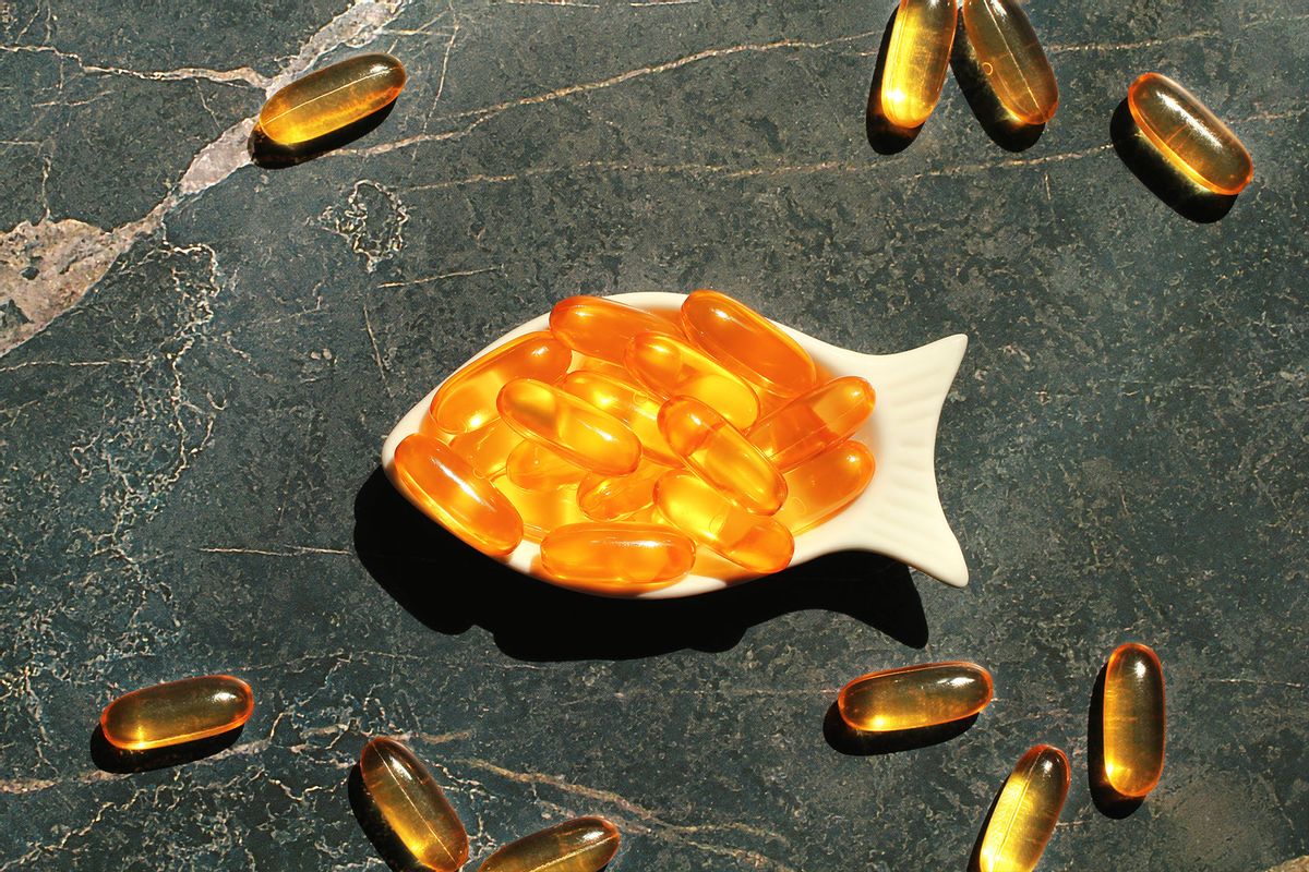 Fish Oil Capsules in Fish-Shaped Bowl (Getty Images/Marina Sidorova)