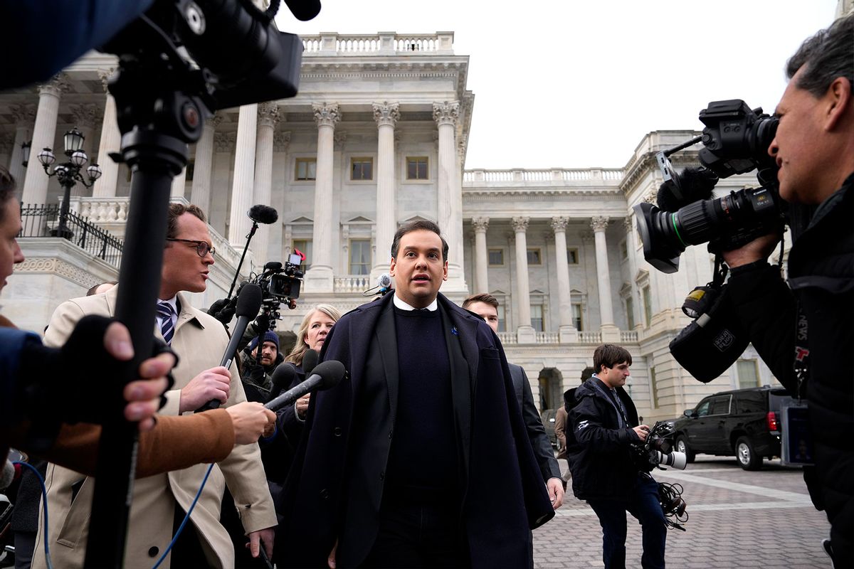Rep. George Santos (R-NY) is surrounded by journalists as he leaves the U.S. Capitol after his fellow members of Congress voted to expel him from the House of Representatives on December 01, 2023 in Washington, DC. (Drew Angerer/Getty Images)