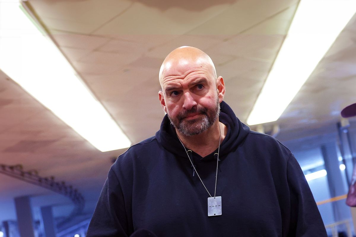 U.S. Sen. John Fetterman (D-PA) speaks to reporters before a Senate luncheon at the U.S. Capitol on December 12, 2023 in Washington, DC. (Kevin Dietsch/Getty Images)