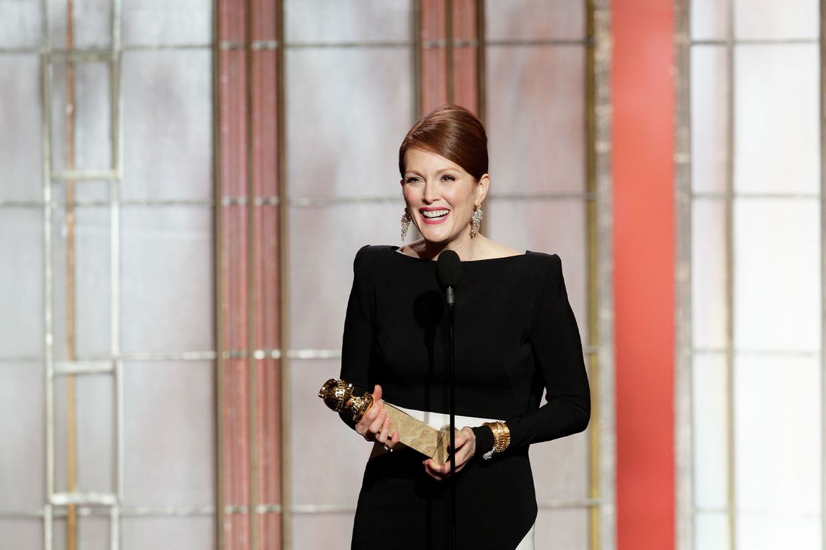In this handout photo provided by NBCUniversal, Julianne Moore accepts the best actress award for Mini-Series or TV Movie, "Game Change" on stage during the 70th Annual Golden Globe Awards at the Beverly Hilton Hotel International Ballroom on January 13, 2013 in Beverly Hills, California. (Paul Drinkwater/NBCUniversal via Getty Images)