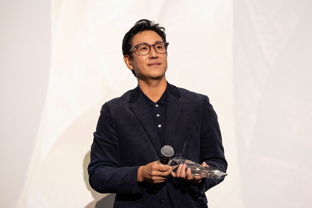 Actor Lee Sun Kyun receives the award for "Excellent Achievement in Film" during the introduction of the "Killing Romance" Midwest premiere at AMC New City 14 on October 07, 2023 in Chicago, Illinois. (Barry Brecheisen/Getty Images)
