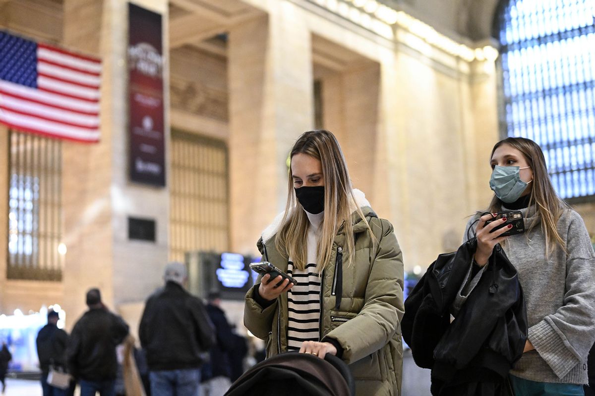 People wear mask after New York City's health officials have issued an advisory, strongly urging New Yorkers to use masks as COVID-19, flu, and RSV cases rise, on December 12, 2022 in New York, United States. (Fatih Aktas/Anadolu Agency via Getty Images)