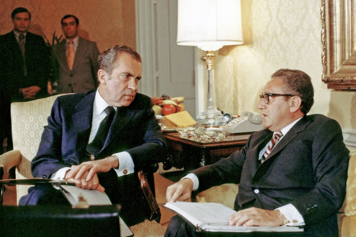 US President Richard Nixon (left) and National Security Advisor Henry Kissinger talk together, Washington DC, November 25, 1972. (White House via CNP/Getty Images)
