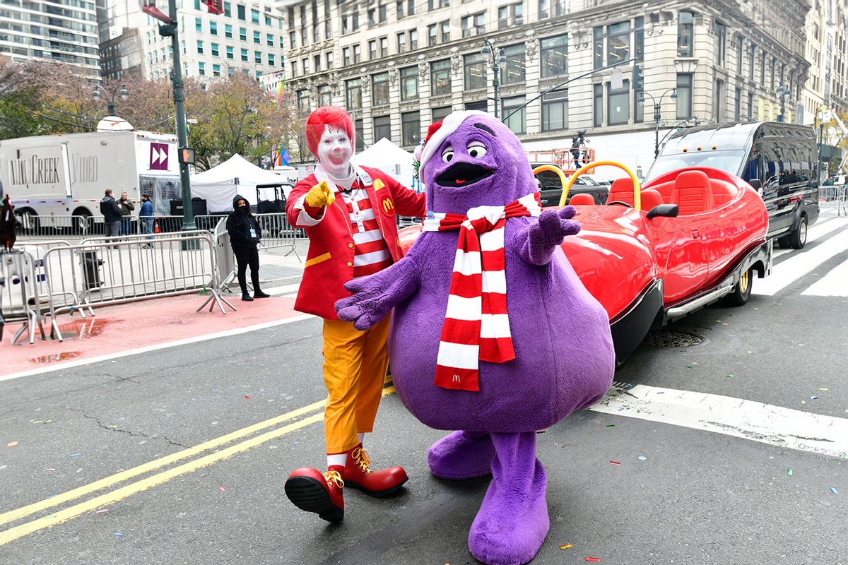 Ronald McDonald (wearing face shield) and Grimace appear in the 94th Annual Macy's Thanksgiving Day Parade¨ on November 24, 2020 in New York City. (Eugene Gologursky/Getty Images for Macy's, Inc.)