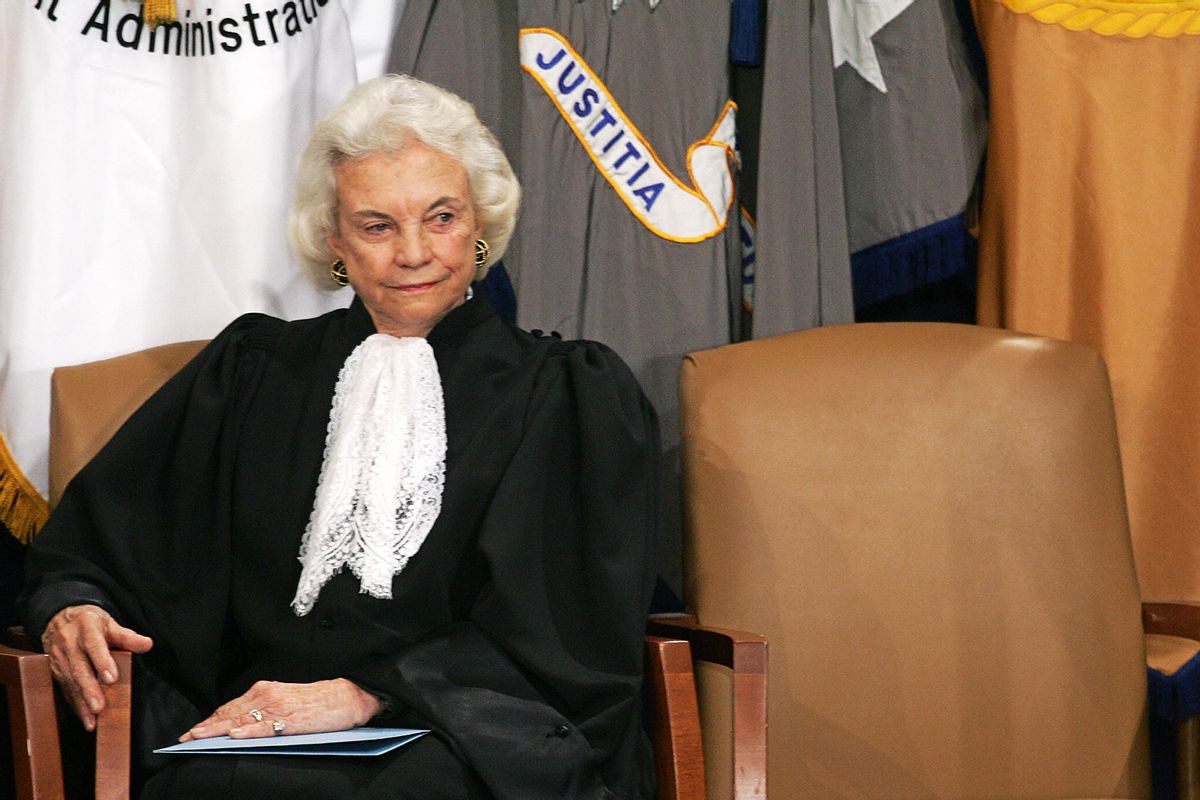 Associate Supreme Court Justice Sandra Day O'Connor looks on during an installation ceremony for US Attorney General Alberto Gonzales at the US Department of Justice 14 February 2005 in Washington, DC. (PAUL J.RICHARDS/AFP via Getty Images)