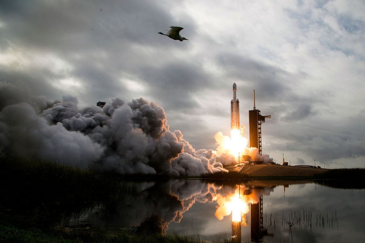 In this handout provided by NASA, a SpaceX Falcon Heavy rocket with the Psyche spacecraft onboard is launched from Launch Complex 39A, October 13, 2023 at NASA's Kennedy Space Center in Cape Canaveral, Florida. (Aubrey Gemignani/NASA via Getty Images)