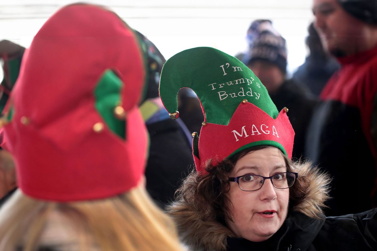 Supporters wait in line outside of the the Kellogg Arena to see U.S. President Donald Trump speak at his "Merry Christmas" rally being held at the Kellogg Arena on December 18, 2019 in Battle Creek, Michigan. (Scott Olson/Getty Images)