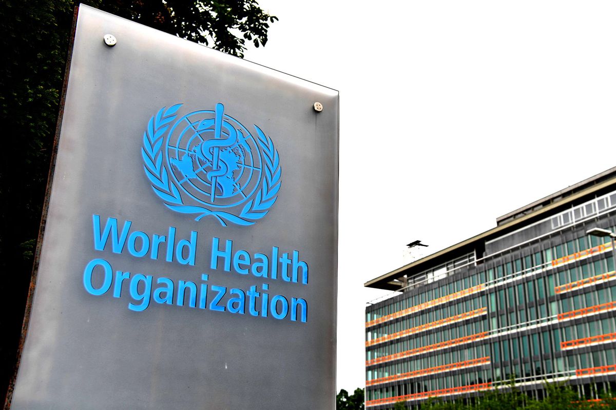 Logo of the World Health Organization WHO with the WHO headquarters in the background in Geneva, Switzerland. (Lian Yi/Xinhua via Getty Images)