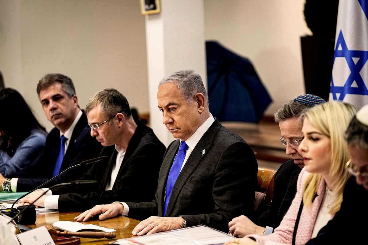 Israel's Prime Minister Benjamin Netanyahu (C) chairs a cabinet meeting at the Kirya military base, which houses the Israeli Ministry of Defence, in Tel Aviv on December 24, 2023. (OHAD ZWIGENBERG/POOL/AFP via Getty Images)