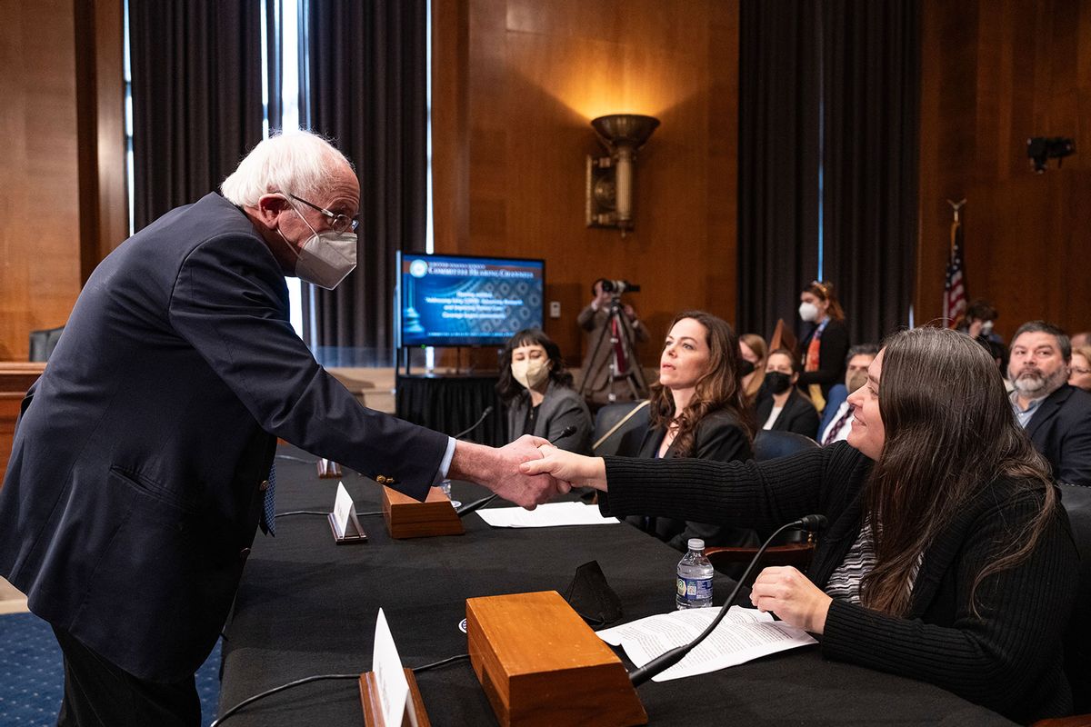 Committee chairman Sen. Bernie Sanders (I-VT) shakes hands with long Covid patient Nicole Heim as he arrives for a Senate Committee on Health, Education, Labor and Pensions hearing titled "Addressing Long COVID: Advancing Research and Improving Patient Care" on Capitol Hill January 18, 2024 in Washington, DC. (Drew Angerer/Getty Images)