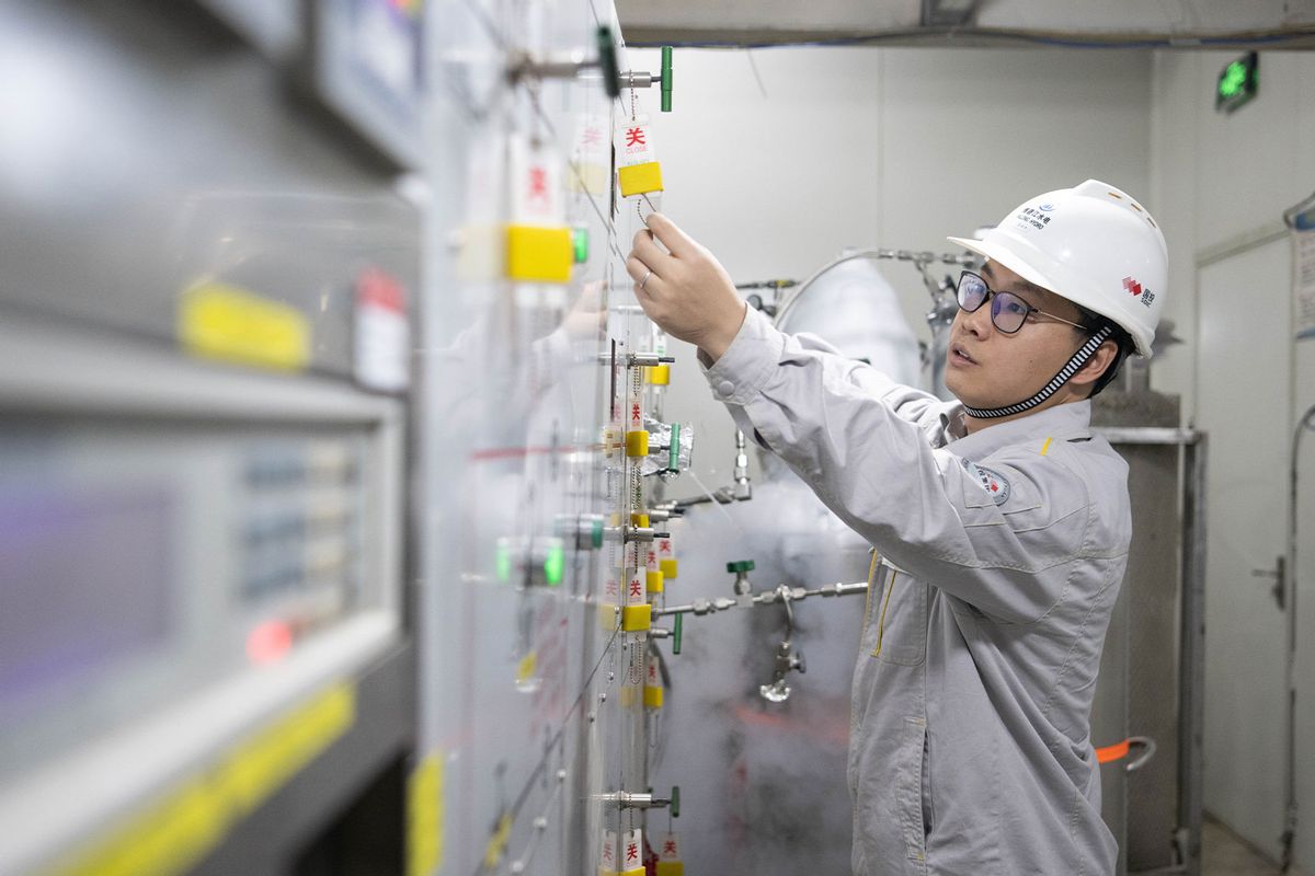 This photo taken on Nov. 7, 2023 shows a researcher from Shanghai Jiao Tong University debugging experimental facilities at the Deep Underground and Ultra-low Radiation Background Facility for Frontier Physics Experiments DURF in Liangshan Yi Autonomous Prefecture of southwest China's Sichuan Province. (Xu Bingjie/Xinhua via Getty Images)