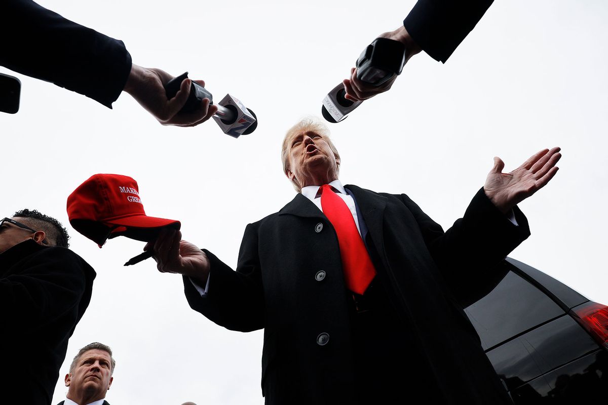 Republican presidential candidate, former U.S. President Donald Trump talks to reporters while visiting the polling site at Londonderry High School on January 23, 2024 in Londonderry, New Hampshire. (Chip Somodevilla/Getty Images)