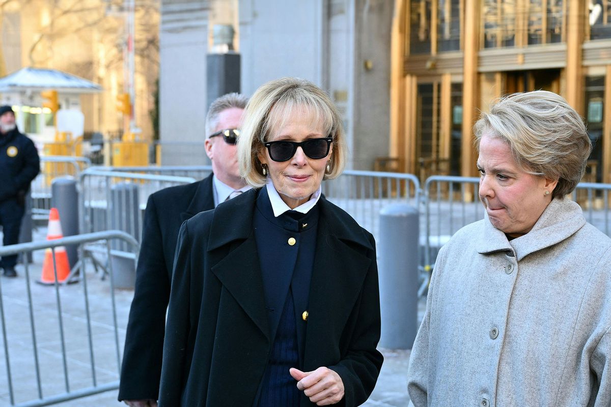 E. Jean Carroll (C) leaves the Manhattan Federal Court for her civil defamation trial against former US President Donald Trump after it was canceled for the day, in New York City on January 22, 2024. (ANGELA WEISS/AFP via Getty Images)
