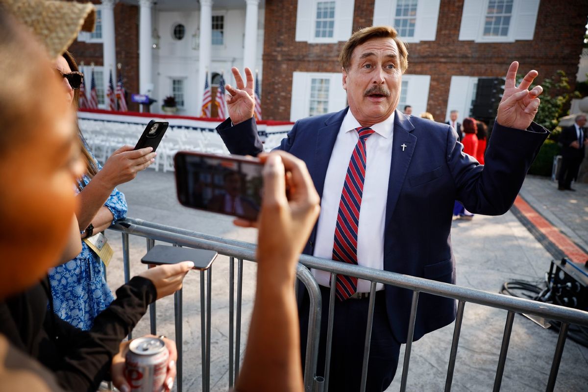 Businessman and election conspiracy theorist Mike Lindell talks with reporters outside the club house at the Trump National Golf Club hours ahead of a speech by former U.S. President Donald Trump on June 13, 2023 in Bedminster, New Jersey (Chip Somodevilla/Getty Images)