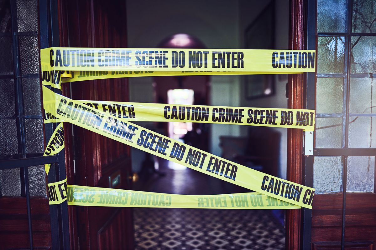 Shot of crime scene tape put up at a scene to warn off people (Getty Images/Charday Penn)