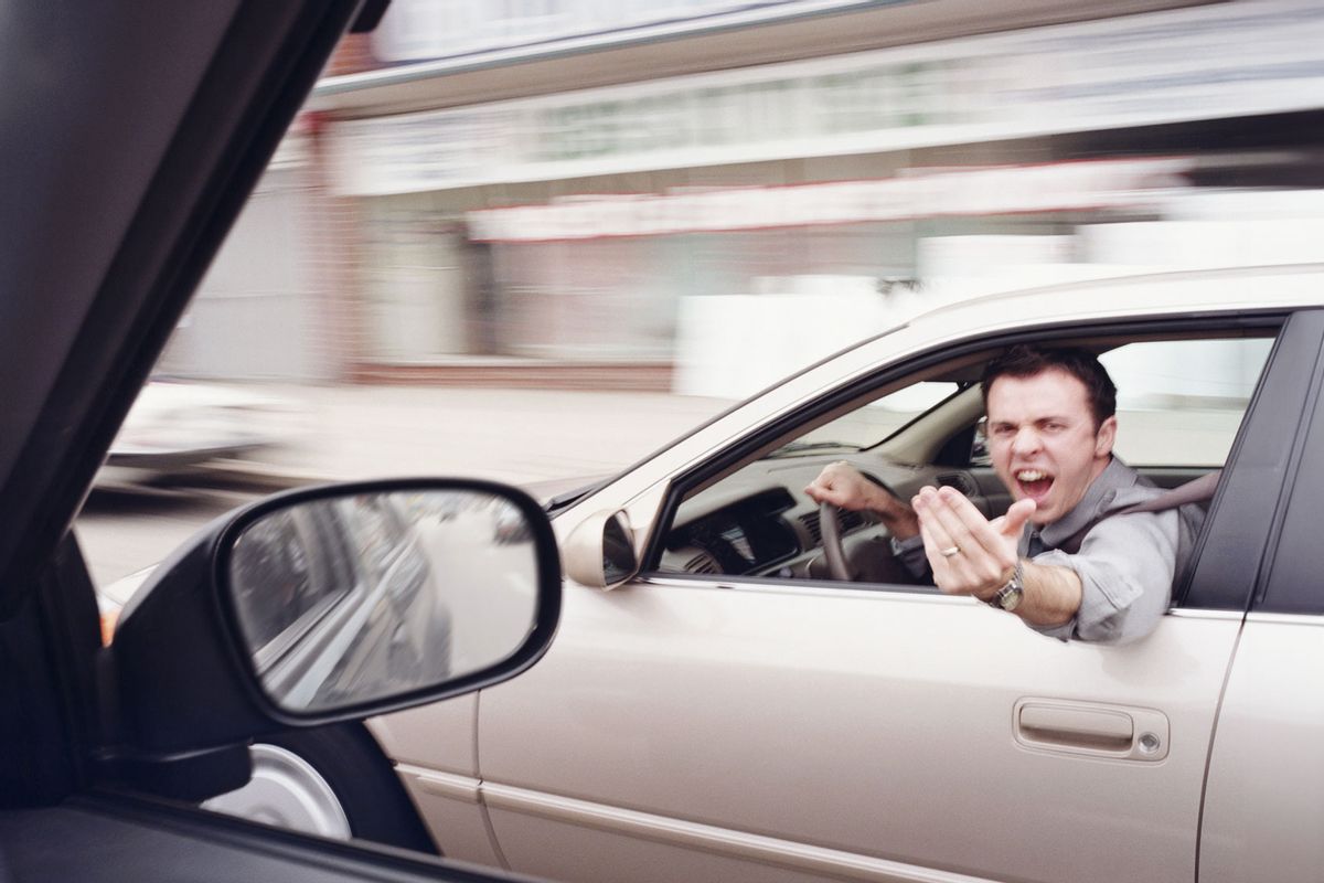 Man in car gesticulating angrily at another driver (Getty Images/Sean Murphy)