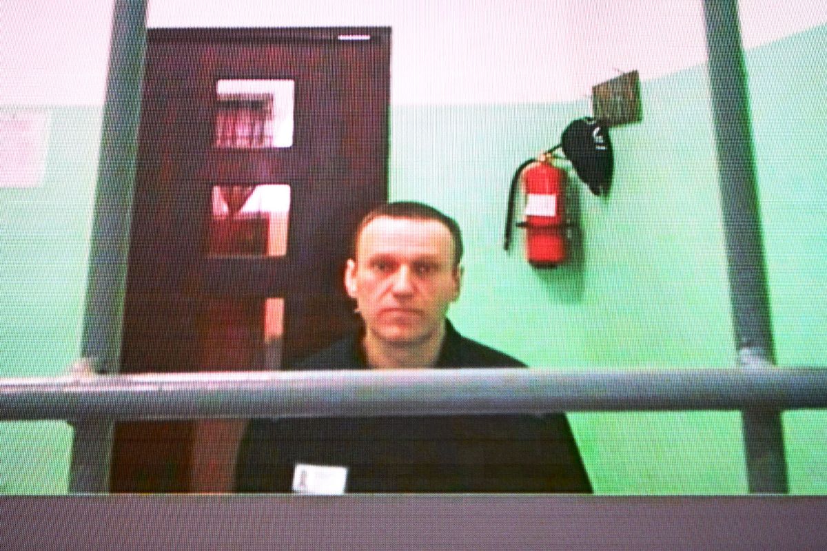 Jailed Russian opposition figure Alexei Navalny is seen on a screen via a video link from his penal colony during court hearings over the extremism criminal case against him at the Russia's Supreme Court in Moscow on June 22, 2023. (NATALIA KOLESNIKOVA/AFP via Getty Images)