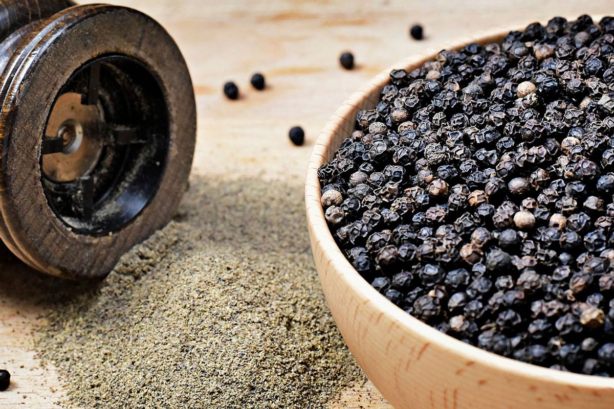 Black peppercorns and milled pepper (Getty Images/Eivaisla)