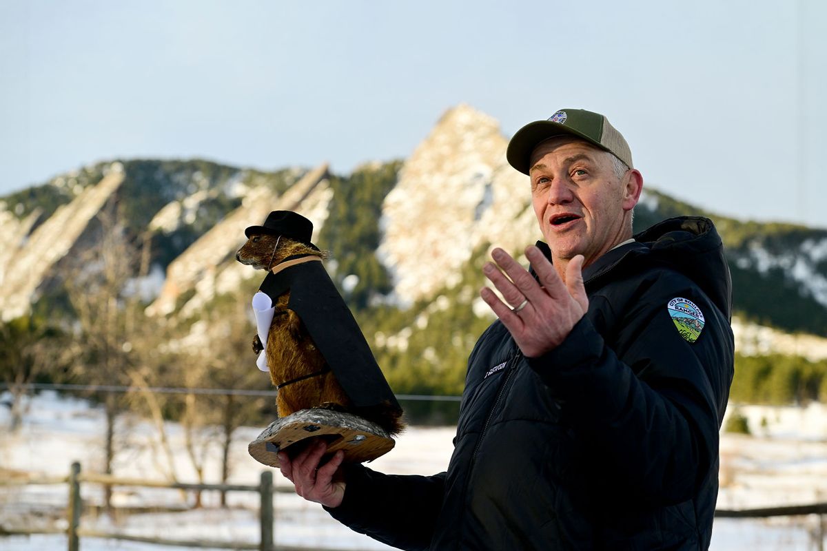 Boulder Open Space and Mountain Parks Ranger Dave Gustafson holds Flatiron Freddy, a stuffed yellow-bellied marmot, during the annual Groundhog Day Celebration at Chautauqua Park in Boulder on Thursday, Feb. 2, 2023. (Matthew Jonas/MediaNews Group/Boulder Daily Camera via Getty Images)