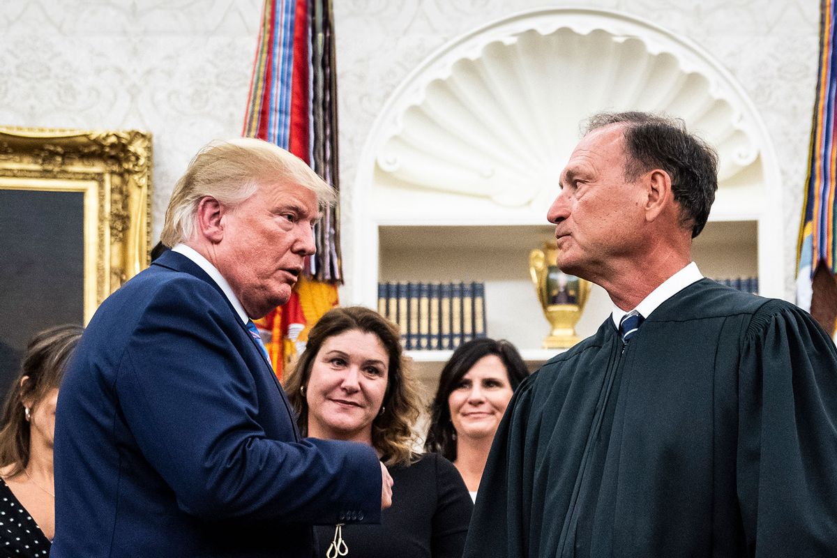 President Donald J. Trump greets Associate Justice of the Supreme Court Samuel Alito as he departs from a ceremony to swear in Secretary of Defense Mark Esper in the Oval Office at the White House on Tuesday, July 23, 2019 in Washington, DC. (Jabin Botsford/The Washington Post via Getty Images)