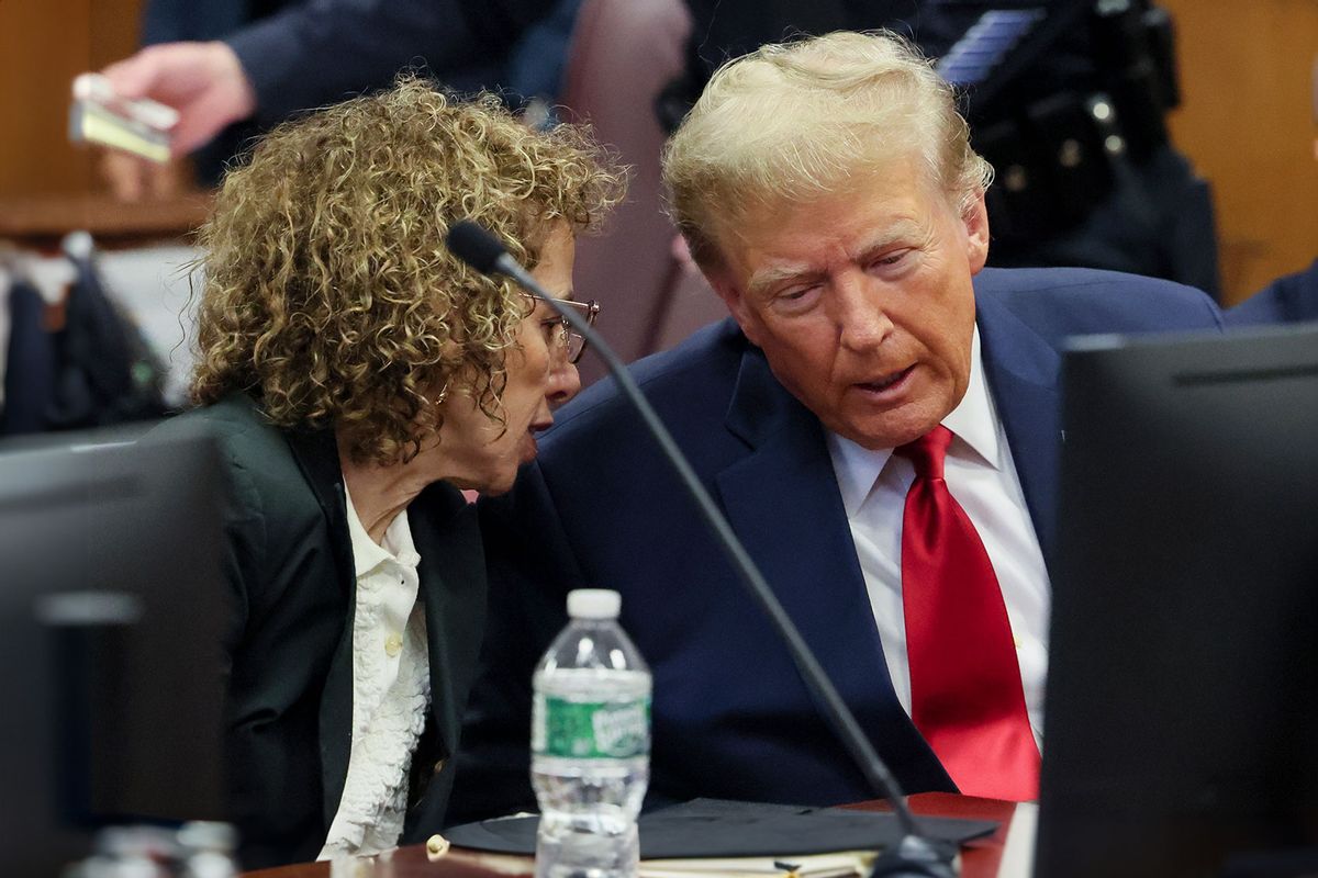 Republican presidential candidate, former U.S. President Donald Trump talks to attorney Susan Necheles during a pre-trial hearing at Manhattan Criminal Court on February 15, 2024 in New York City. (Brendan McDermid-Pool/Getty Images)