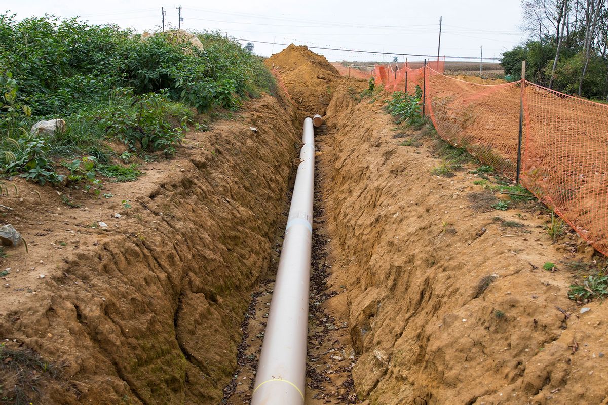 A steel pipeline for natural gas liquids lies in an open-cut trench October 6, 2017 in Lebanon, Pennsylvania. (Robert Nickelsberg/Getty Images)