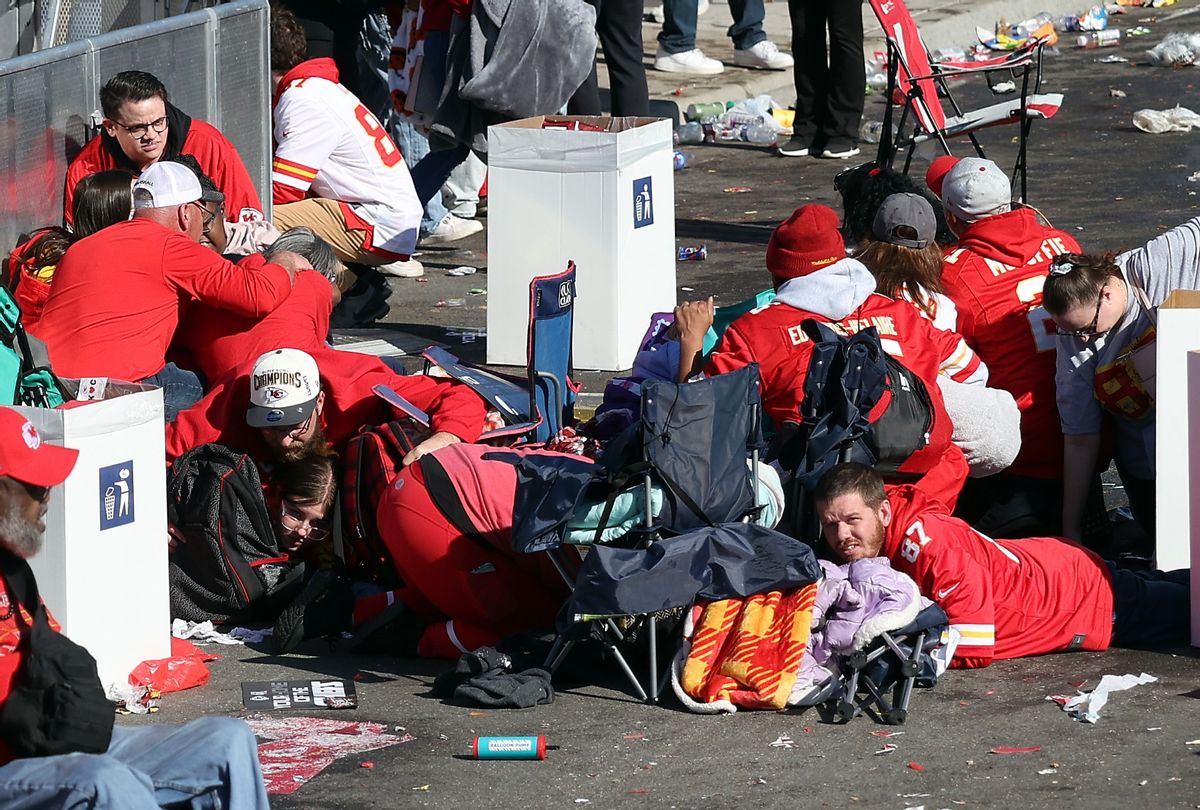 People take cover during a shooting at Union Station during the Kansas City Chiefs Super Bowl LVIII victory parade on February 14, 2024 in Kansas City, Missouri.  (Jamie Squire/Getty Images)