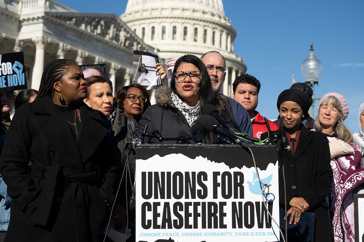 US Representative Rashida Tlaib, Democrat from Michigan, speaks alongside Representative Cori Bush (L), Democrat of Missouri, and Representative Ilhan Omar (R), Democrat of Minnesota, during a press conference with union leaders and supporters of a ceasefire in Gaza outside the US Capitol in Washington, DC, December 14, 2023. (SAUL LOEB/AFP via Getty Images)