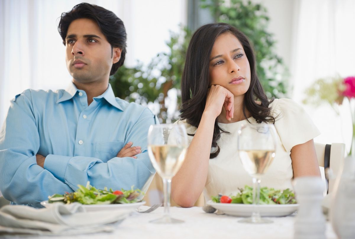 Unhappy couple dining together (Getty stock photo/JGI/Jamie Grill)