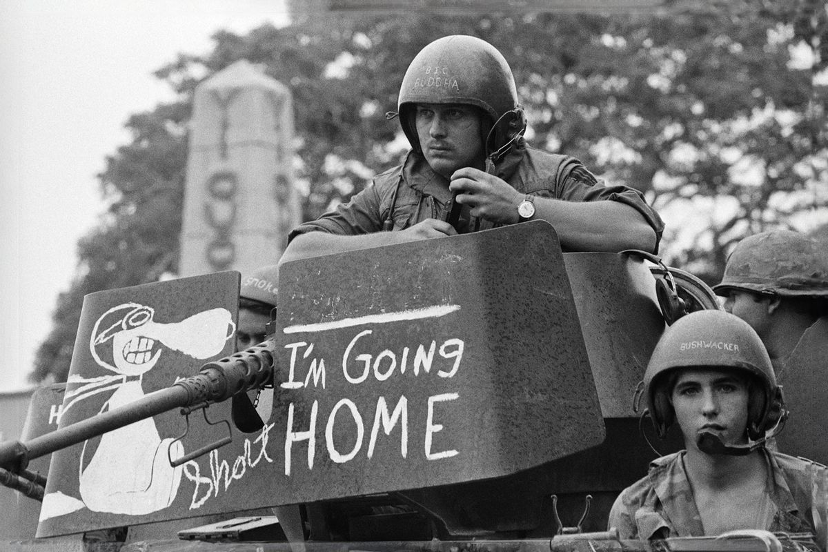 Phrase on gun mount protective shield probably accurately expresses thoughts of GI tank crew member as elements of US armored units move back into combat base, Sept. 30th, 1971, recently turned over to Vietnamese forces. (Getty Images/Bettmann)