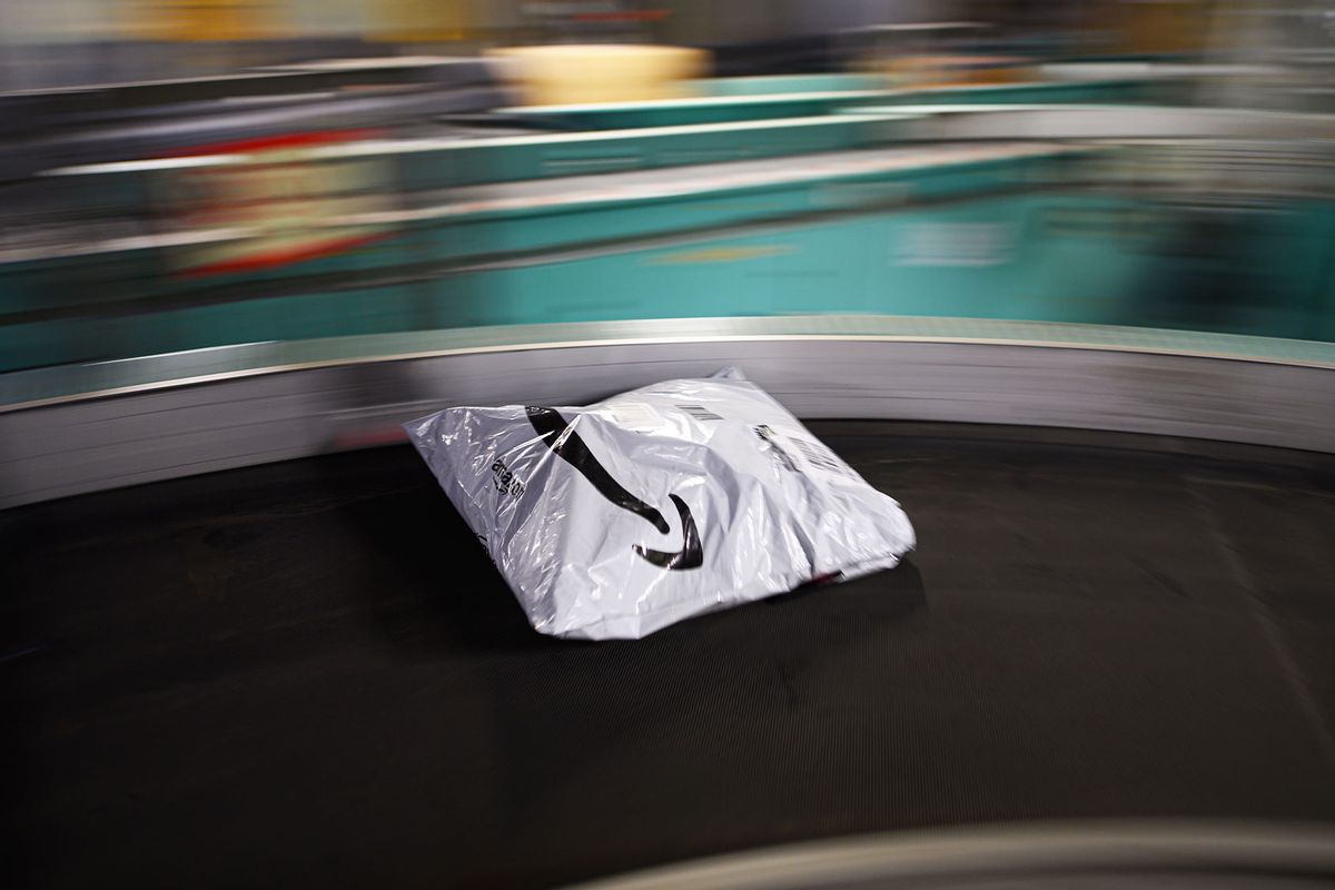 An Amazon package lies on a conveyor belt in the DHL package center. (Robert Michael/picture alliance via Getty Images)