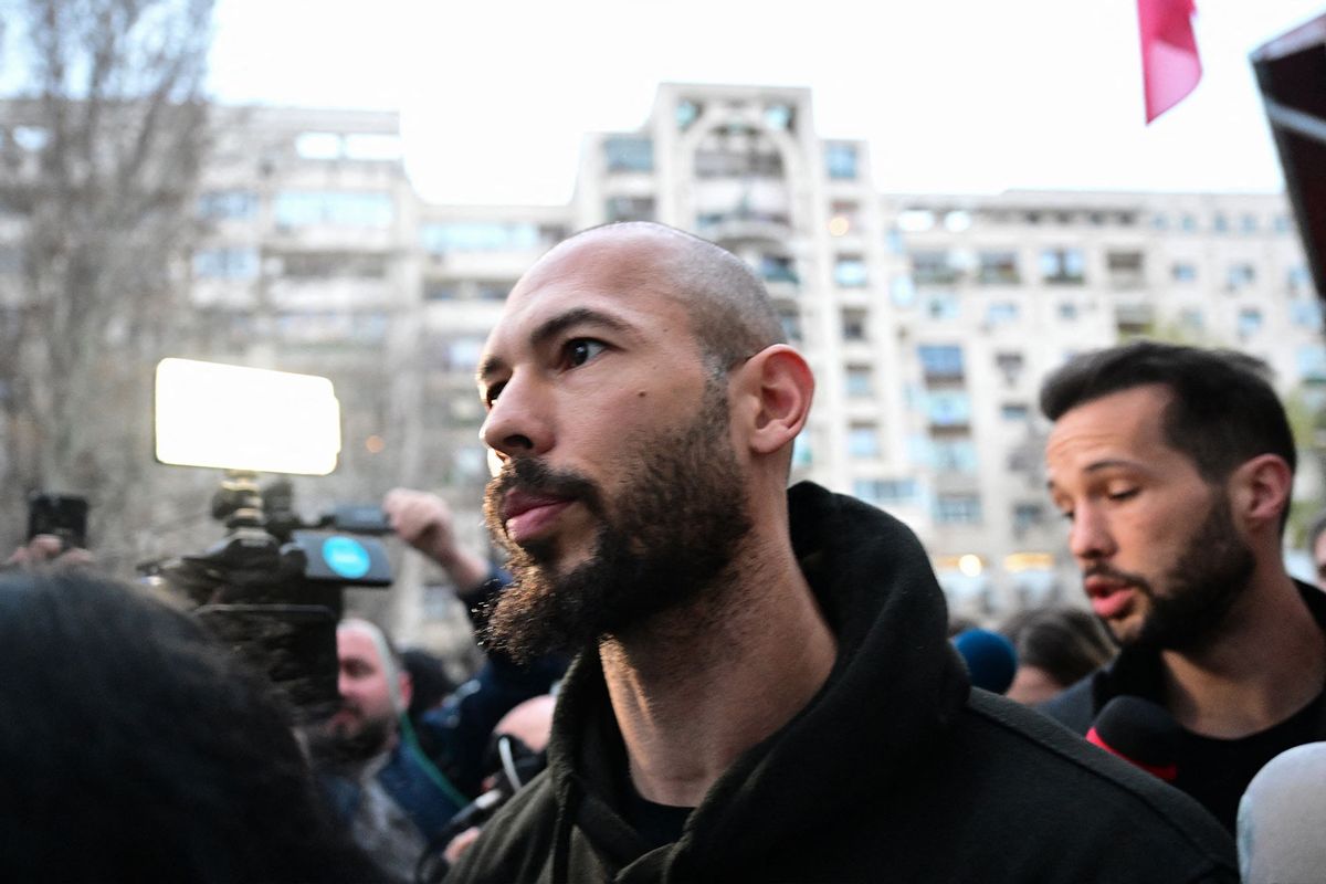 British-US former professional kickboxer and controversial influencer Andrew Tate (L) and his brother Tristan Tate (R) in Bucharest, Romania on March 12, 2024, after they appeared in a court after Romanian police detained them over UK sex offence charges. (DANIEL MIHAILESCU/AFP via Getty Images)