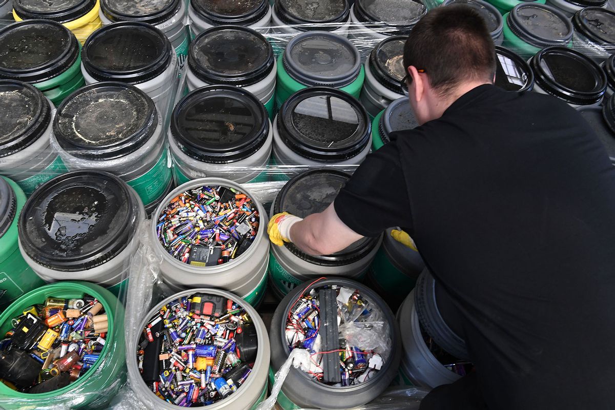 Employees of the Redux Recycling GmbH company sort batteries. (Carmen Jaspersen/picture alliance via Getty Images)