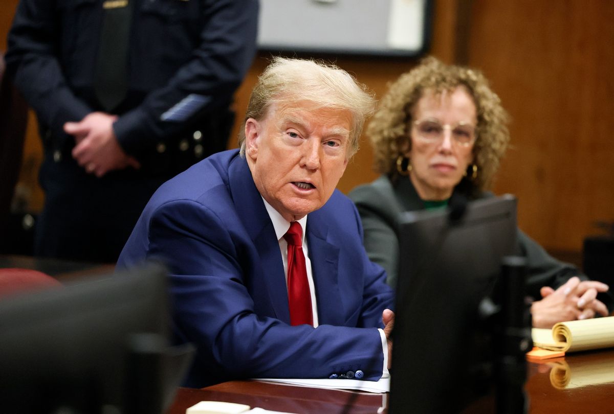Former President Donald Trump waits with his lawyer Susan Necheles for the start of a hearing at Criminal Court on March 25, 2024 in New York City.  (Brendan McDermid-Pool/Getty Images)