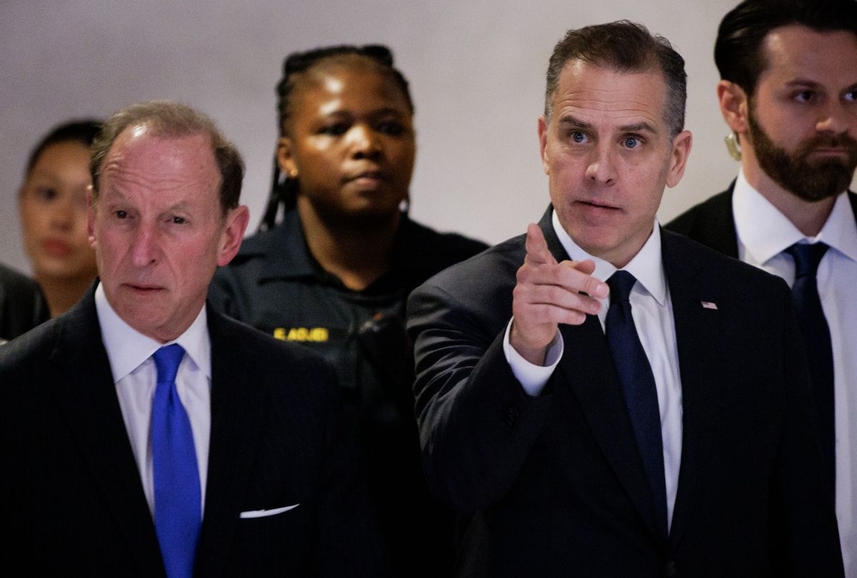 Hunter Biden (center) leaves with his attorney Abbe Lowell (left) for a closed-door deposition on February 28, 2024 in Washington, DC.  (Samuel Corum/Getty Images)