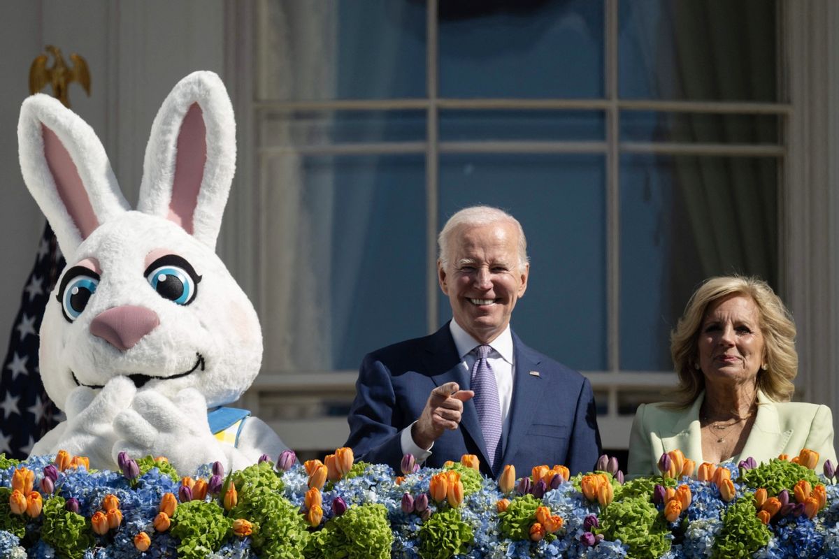 U.S. President Joe Biden, alongside First Lady Jill Biden gestures after speaking at the annual Easter Egg Roll on the South Lawn of the White House in Washington, DC, on April 10, 2023. (ANDREW CABALLERO-REYNOLDS/AFP via Getty Images)
