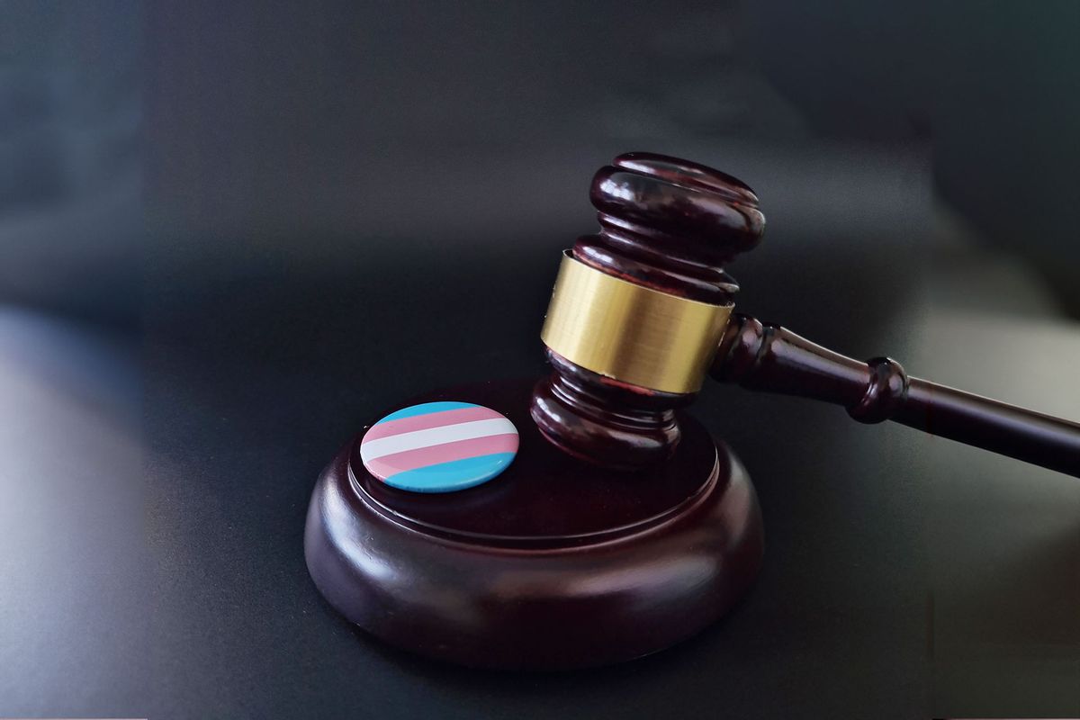 Judge Gavel And Transgender Flag Pin (Getty Images/Nadzeya Haroshka)