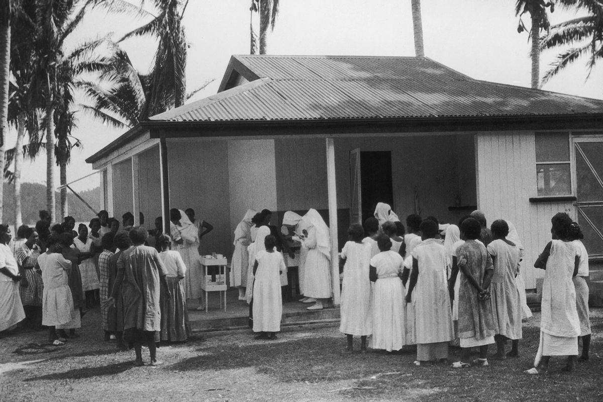 Patients line up for their weekly injections at a clinic for leprosy in Suva, Fiji, circa 1950. (FPG/Hulton Archive/Getty Images)