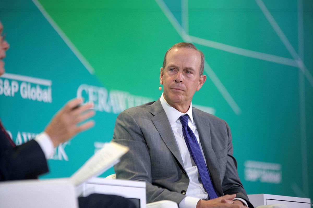 Chevron CEO Mike Wirth (R) speaks with S&P Global Vice Chairman Daniel Yergin during CERAWeek by S&P Global in Houston, Texas on March 6, 2023. (MARK FELIX/AFP via Getty Images)